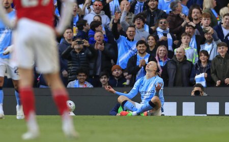 Manchester City edge Arsenal 2-1 to reignite Premier League title race