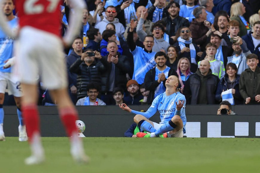 Manchester City edge Arsenal 2-1 to reignite Premier League title race