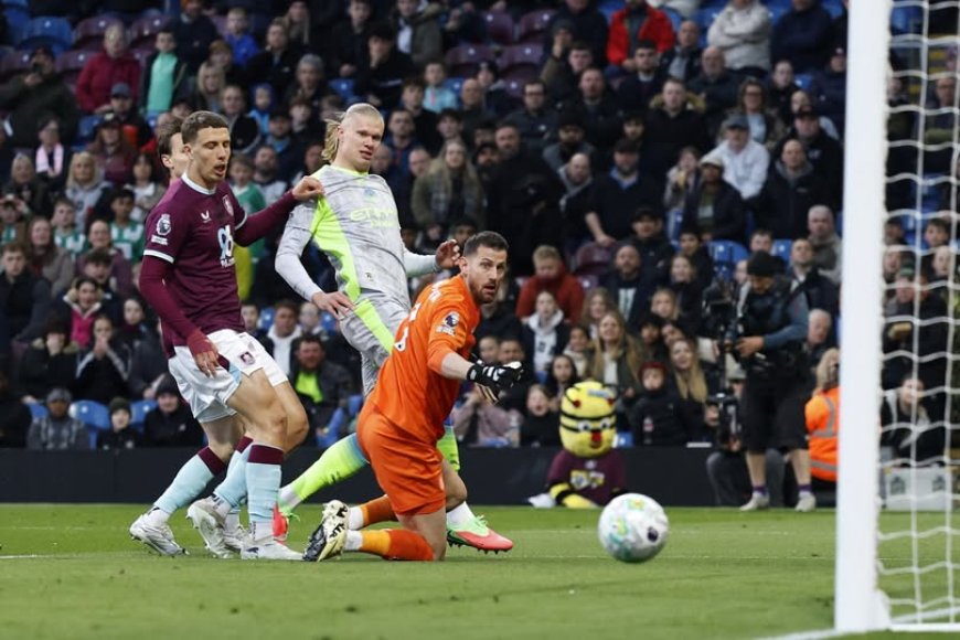 Man City edge Burnley to reclaim top spot as title race intensifies