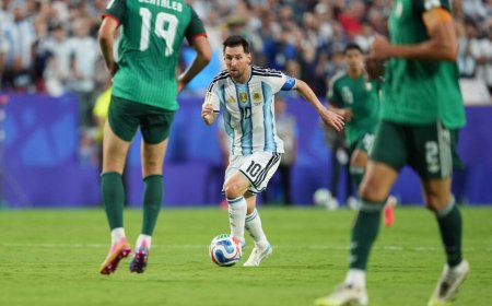 Messi powers Argentina past Algeria with maiden World Cup hat-trick