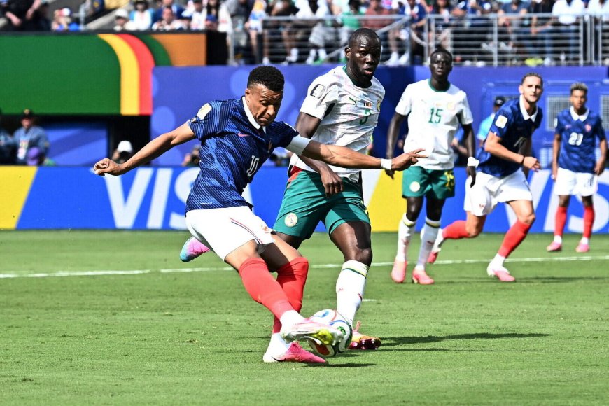 Mbappé makes history as France outlast Senegal in World Cup opener