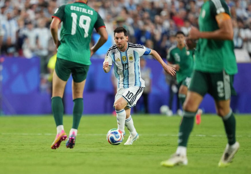 Messi powers Argentina past Algeria with maiden World Cup hat-trick