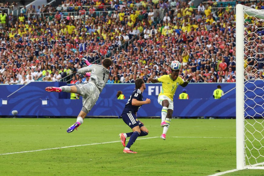 Vinicius brace powers Brazil past Scotland into World Cup knockouts