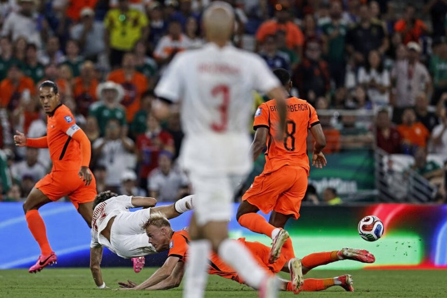 Morocco crash Netherlands out of World Cup on penalties to reach round of 16