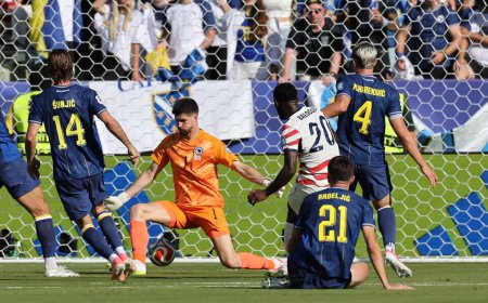 Balogun, Tillman fire 10-man U.S past Bosnia into World Cup last 16
