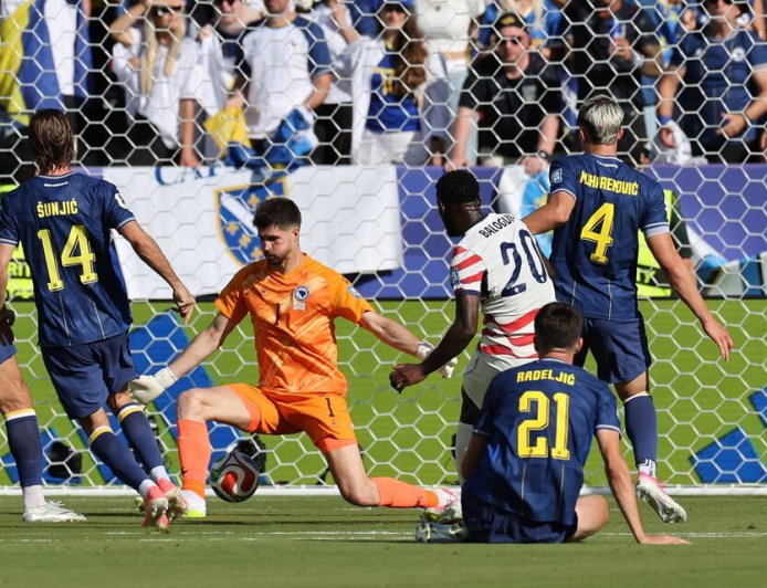 Balogun, Tillman fire 10-man U.S past Bosnia into World Cup last 16