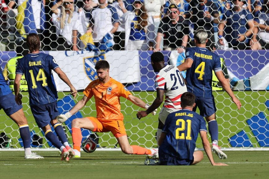 Balogun, Tillman fire 10-man U.S past Bosnia into World Cup last 16